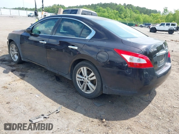 2011 Nissan Maxima SV with VIN 1N4AA5AP5BC841586, listed as a IAAI auction lot 42162383 with 412,977 mi miles and . Bid and sale history available at DreamBid. Image 3.