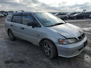 1995 Honda Odyssey with VIN RA21049652, listed as a Copart auction lot 85426404 with 271,632 mi miles and Clean title. Bid and sale history available at DreamBid. Image 4.
