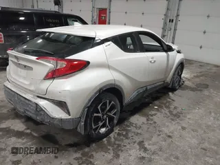 2018 Toyota C-HR XLE with VIN NMTKHMBX5JR027307, listed as a IAAI auction lot 41598077 with 123,032 mi miles. Bid and sale history available at carsss.com. Image 4.