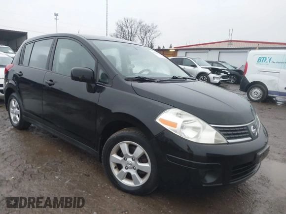 2009 Nissan Versa 1.8 SL with VIN 3N1BC13EX9L390055, listed as a IAAI auction lot 41455877 with 126,718 mi miles. Bid and sale history available at carsss.com. Image 1.