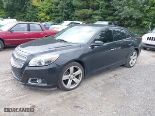 2013 Chevrolet Malibu LTZ with VIN 1G11J5SX1DF191366, listed as a IAAI auction lot 40121794 with 111,036 mi miles. Bid and sale history available at carsss.com. Image 2.