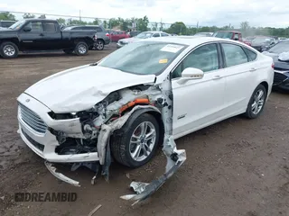 2016 Ford Fusion Titanium with VIN 3FA6P0SU5GR287017, listed as a IAAI auction lot 42316622 with 97,000 mi miles and . Bid and sale history available at DreamBid. Image 17.