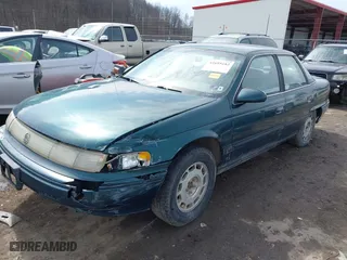 1995 Mercury Sable GS with VIN 1MELM50U8SA632936, listed as a IAAI auction lot 41695182 with 124,194 mi miles. Bid and sale history available at carsss.com. Image 2.
