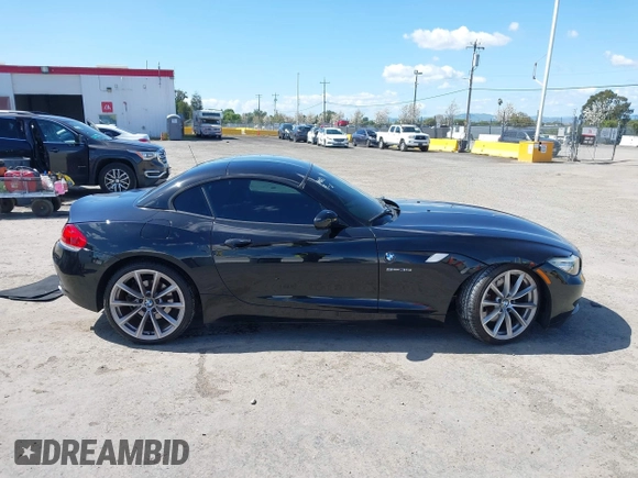 2011 BMW Z4 sDrive35i with VIN WBALM7C58BE383710, listed as a IAAI auction lot 41953452 with 102,510 mi miles. Bid and sale history available at carsss.com. Image 13.