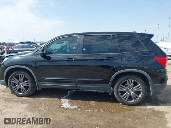 2019 Honda Passport EX-L with VIN 5FNYF7H59KB003011, listed as a IAAI auction lot 41563219 with 78,239 mi miles and . Bid and sale history available at carsss.com. Image 14.