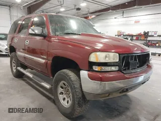 2003 GMC Yukon SLT with VIN 1GKEK13Z73J301058, listed as a IAAI auction lot 41206130 with 301,411 mi miles. Bid and sale history available at carsss.com. Image 1.