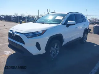 2023 Toyota RAV4 Hybrid LE with VIN 4T3MWRFV8PU097560, listed as a IAAI auction lot 41662609 with 21,004 mi miles. Bid and sale history available at carsss.com. Image 2.