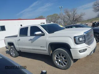 2017 GMC Sierra 1500 Denali z VIN 3GTU2PEC8HG502379, wystawiony jako IAAI lot #42040538 z przebiegiem 108 960 mil mil oraz . Historia ofert i sprzedaży dostępna na DreamBid. Obrazek 13.