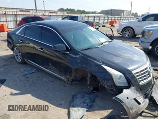 2014 Cadillac XTS Luxury with VIN 2G61M5S37E9169624, listed as a IAAI auction lot 41597528 with 159,041 mi miles. Bid and sale history available at carsss.com. Image 1.