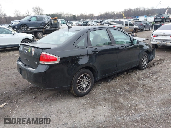 2011 Ford Focus SE with VIN 1FAHP3FN6BW140790, listed as a IAAI auction lot 41277430 with 114,192 mi miles. Bid and sale history available at carsss.com. Image 4.