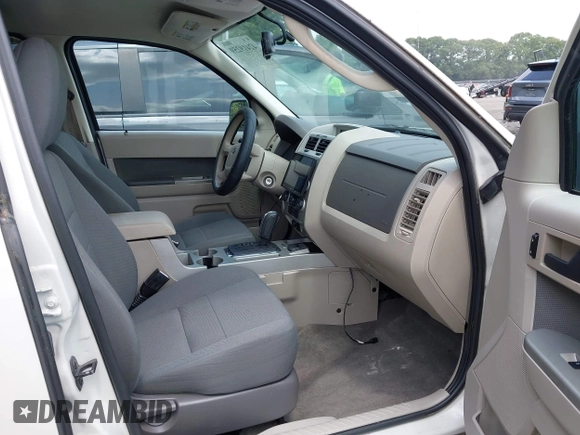 2009 Ford Escape Hybrid with VIN 1FMCU49359KA49066, listed as a IAAI auction lot 42419259 with 199,722 mi miles and . Bid and sale history available at DreamBid. Image 5.