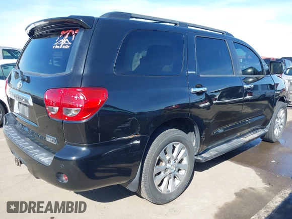 2014 Toyota Sequoia Limited with VIN 5TDKY5G13ES055656, listed as a IAAI auction lot 41616322 with 118,859 mi miles. Bid and sale history available at carsss.com. Image 4.