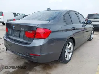 2013 BMW 3 Series 320i with VIN WBA3B1C53DK128602, listed as a IAAI auction lot 41952771 with 103,564 mi miles and . Bid and sale history available at carsss.com. Image 4.