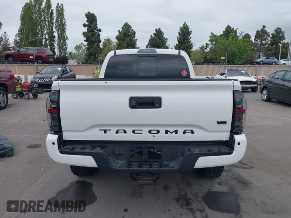 2021 Toyota Tacoma SR5 z VIN 3TMDZ5BN2MM100245, wystawiony jako IAAI lot #42078914 z przebiegiem 58 153 mil mil oraz . Historia ofert i sprzedaży dostępna na DreamBid. Obrazek 17.