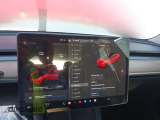 2021 Tesla Model 3 Long Range with VIN 5YJ3E1EB1MF071634, listed as a IAAI auction lot 41964321 with 39,596 mi miles. Bid and sale history available at carsss.com. Image 18.