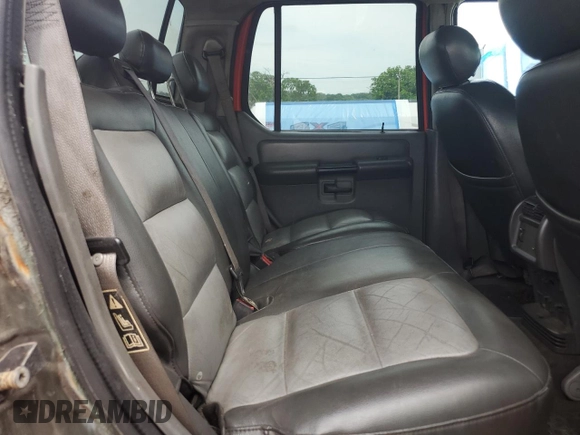 2004 Ford Explorer Sport Trac XLS z VIN 1FMDU77K94UA77644, wystawiony jako Copart lot #57495175 z przebiegiem Nie podano mil oraz Czysty tytuł • Clean title. Historia ofert i sprzedaży dostępna na DreamBid. Obrazek 10.