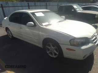 2003 Nissan Maxima SE z VIN JN1DA31D03T523896, wystawiony jako IAAI lot #31318003 z przebiegiem 242 040 mil mil oraz . Historia ofert i sprzedaży dostępna na DreamBid. Obrazek 1.