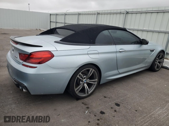 2014 BMW M6 z VIN WBSLZ9C56EDZ78719, wystawiony jako Copart lot #42445545 z przebiegiem 63 691 mil mil oraz Szkoda całkowita • Salvage title. Historia ofert i sprzedaży dostępna na DreamBid. Obrazek 3.