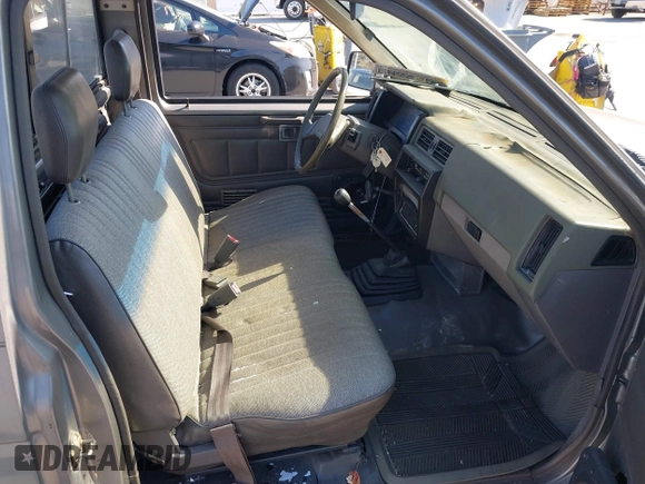 1988 Nissan Hardbody z VIN 1N6ND11S0JC345025, wystawiony jako IAAI lot #41899460 z przebiegiem 132 502 mil mil oraz . Historia ofert i sprzedaży dostępna na DreamBid. Obrazek 5.
