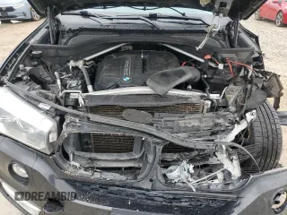 2014 BMW X5 xDrive35i z VIN 5UXKR0C59E0H23070, wystawiony jako Copart lot #55814815 z przebiegiem 113 895 mil mil oraz Szkody całkowita. Historia ofert i sprzedaży dostępna na DreamBid. Obrazek 11.