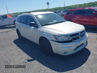 2014 Dodge Journey SE with VIN 3C4PDCAB9ET121415, listed as a IAAI auction lot 42138601 with 157,043 mi miles. Bid and sale history available at carsss.com. Image 1.