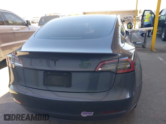 2018 Tesla Model 3 Long Range Battery with VIN 5YJ3E1EA7JF163401, listed as a IAAI auction lot 41829681 with 90,065 mi miles. Bid and sale history available at carsss.com. Image 15.