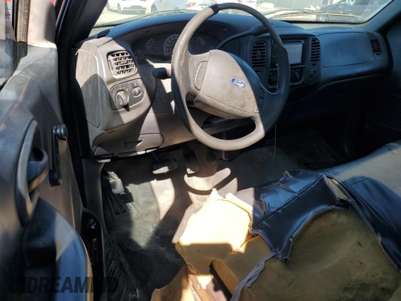 2003 Ford F-150 XL with VIN 1FTRF17203NA88672, listed as a Copart auction lot 49455585 with 471,132 mi miles and Salvage Title. Bid and sale history available at DreamBid. Image 8.