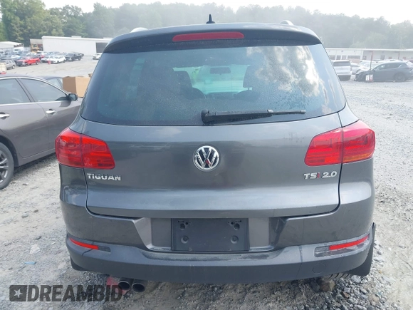 2014 Volkswagen Tiguan SE z VIN WVGAV3AX0EW576108, wystawiony jako IAAI lot #42405804 z przebiegiem 117 530 mil mil oraz . Historia ofert i sprzedaży dostępna na DreamBid. Obrazek 16.
