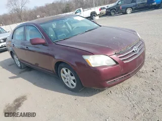 2005 Toyota Avalon XL with VIN 4T1BK36B25U057969, listed as a IAAI auction lot 41798579 with 241,831 mi miles. Bid and sale history available at carsss.com. Image 1.