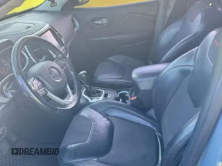 2015 Jeep Cherokee Trailhawk with VIN 1C4PJMBS1FW529559, listed as a Copart auction lot 66581755 with 113,915 mi miles and Salvage title. Bid and sale history available at DreamBid. Image 5.