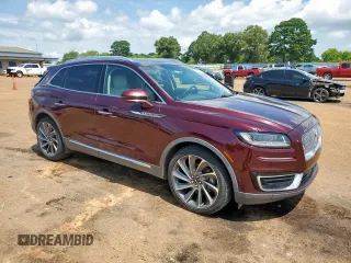 2019 Lincoln Nautilus Reserve with VIN 2LMPJ6LP7KBL61802, listed as a Copart auction lot 64099465 with 57,222 mi miles and Salvage title. Bid and sale history available at DreamBid. Image 4.