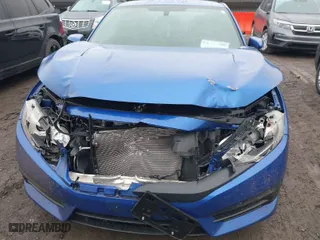 2017 Honda Civic Coupe LX with VIN 2HGFC4B5XHH310389, listed as a IAAI auction lot 41569031 with 79,694 mi miles. Bid and sale history available at carsss.com. Image 6.