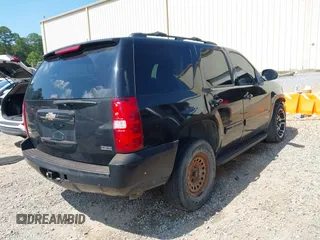 2011 Chevrolet Tahoe LS with VIN 1GNSCAE07BR278849, listed as a IAAI auction lot 42647528 with 194,920 mi miles and . Bid and sale history available at DreamBid. Image 4.