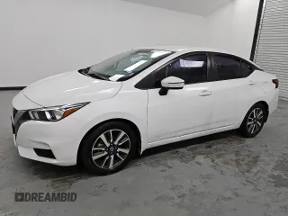 2020 Nissan Versa SV z VIN 3N1CN8EV5LL880415, wystawiony jako Copart lot #50328525 z przebiegiem 74 501 mil mil oraz Czysty tytuł • Clean title. Historia ofert i sprzedaży dostępna na DreamBid. Obrazek 1.