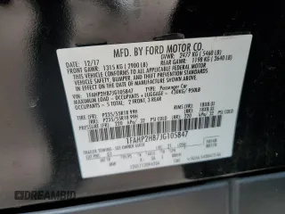 2018 Ford Taurus SEL with VIN 1FAHP2H87JG105847, listed as a Copart auction lot 49667215 with 70,625 mi miles and Salvage title. Bid and sale history available at DreamBid. Image 15.