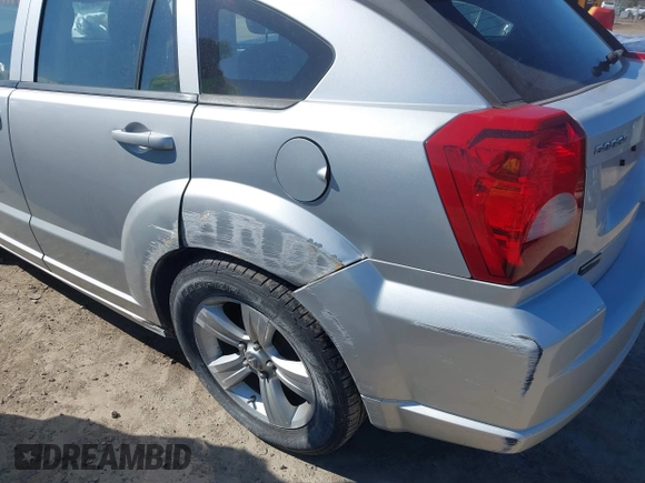 2011 Dodge Caliber Mainstreet with VIN 1B3CB3HA9BD295750, listed as a IAAI auction lot 42049996 with Not Provided miles. Bid and sale history available at carsss.com. Image 17.