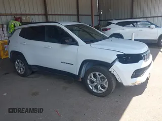 2024 Jeep Compass Latitude with VIN 3C4NJDBN3RT117560, listed as a IAAI auction lot 42732859 with 34,412 mi miles and . Bid and sale history available at DreamBid. Image 1.