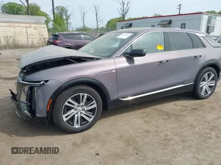 2024 Cadillac LYRIQ z VIN 1GYKPMRLXRZ141816, wystawiony jako IAAI lot #42113732 z przebiegiem 7 704 mil mil oraz . Historia ofert i sprzedaży dostępna na DreamBid. Obrazek 2.