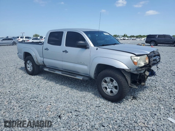 2010 Toyota Tacoma PreRunner with VIN 3TMKU4HN1AM025931, listed as a Copart auction lot 54336905 with 184,868 mi miles and Salvage title. Bid and sale history available at DreamBid. Image 4.
