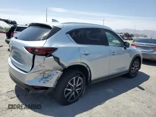 2018 Mazda CX-5 Grand Touring with VIN JM3KFBDM0J0377243, listed as a Copart auction lot 62199295 with 37,930 mi miles and Salvage title. Bid and sale history available at DreamBid. Image 3.