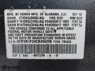 2012 Honda Ridgeline RT with VIN 5FPYK1F24CB456298, listed as a IAAI auction lot 40869948 with 123,329 mi miles. Bid and sale history available at carsss.com. Image 9.