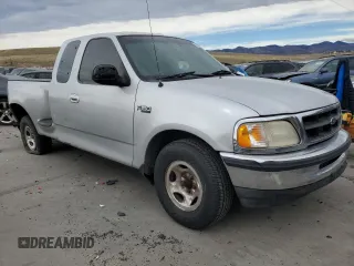 1998 Ford F-150 with VIN 2FTZX0729WCA50004, listed as a Copart auction lot 50028895 with 291,952 mi miles and Salvage title. Bid and sale history available at DreamBid. Image 4.
