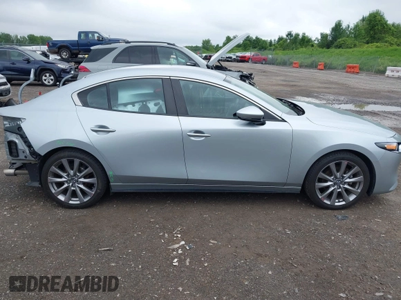 2021 Mazda 3 Select with VIN 3MZBPBBL8MM251968, listed as a IAAI auction lot 42586031 with 54,655 mi miles and . Bid and sale history available at DreamBid. Image 14.