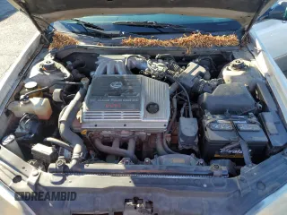 1999 Lexus ES 300 z VIN JT8BF28G4X5060914, wystawiony jako Copart lot #45912725 z przebiegiem 197 401 mil mil oraz Szkoda całkowita • Salvage title. Historia ofert i sprzedaży dostępna na DreamBid. Obrazek 11.
