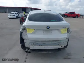 2015 BMW X4 xDrive28i with VIN 5UXXW3C53F0M88714, listed as a IAAI auction lot 41483692 with 132,054 mi miles. Bid and sale history available at carsss.com. Image 16.
