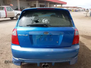 2005 Kia Spectra with VIN KNAFE161655095608, listed as a IAAI auction lot 41990765 with 51,415 mi miles. Bid and sale history available at carsss.com. Image 16.