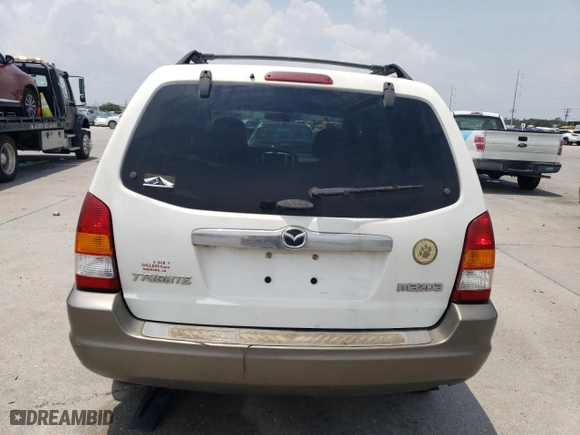 2003 Mazda Tribute LX with VIN 4F2YZ04103KM54964, listed as a Copart auction lot 82311133 with 188,858 mi miles and Salvage Title. Bid and sale history available at carsss.com. Image 6.