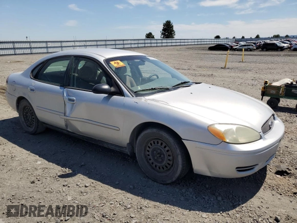 2005 Ford Taurus SE with VIN 1FAFP53U25A303516, listed as a Copart auction lot 63250505 with 203,463 mi miles and Salvage title. Bid and sale history available at DreamBid. Image 4.