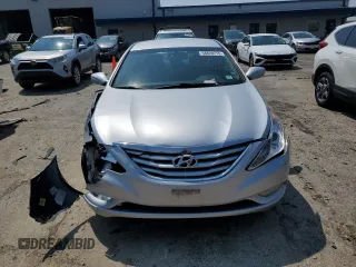 2013 Hyundai Sonata GLS z VIN 5NPEB4AC6DH710089, wystawiony jako Copart lot #58820215 z przebiegiem 111 475 mil mil oraz Czysty tytuł • Clean title. Historia ofert i sprzedaży dostępna na DreamBid. Obrazek 5.
