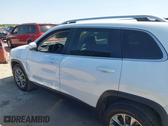 2021 Jeep Cherokee Latitude Lux with VIN 1C4PJLMX3MD176673, listed as a IAAI auction lot 41989569 with 64,156 mi miles and . Bid and sale history available at DreamBid. Image 14.